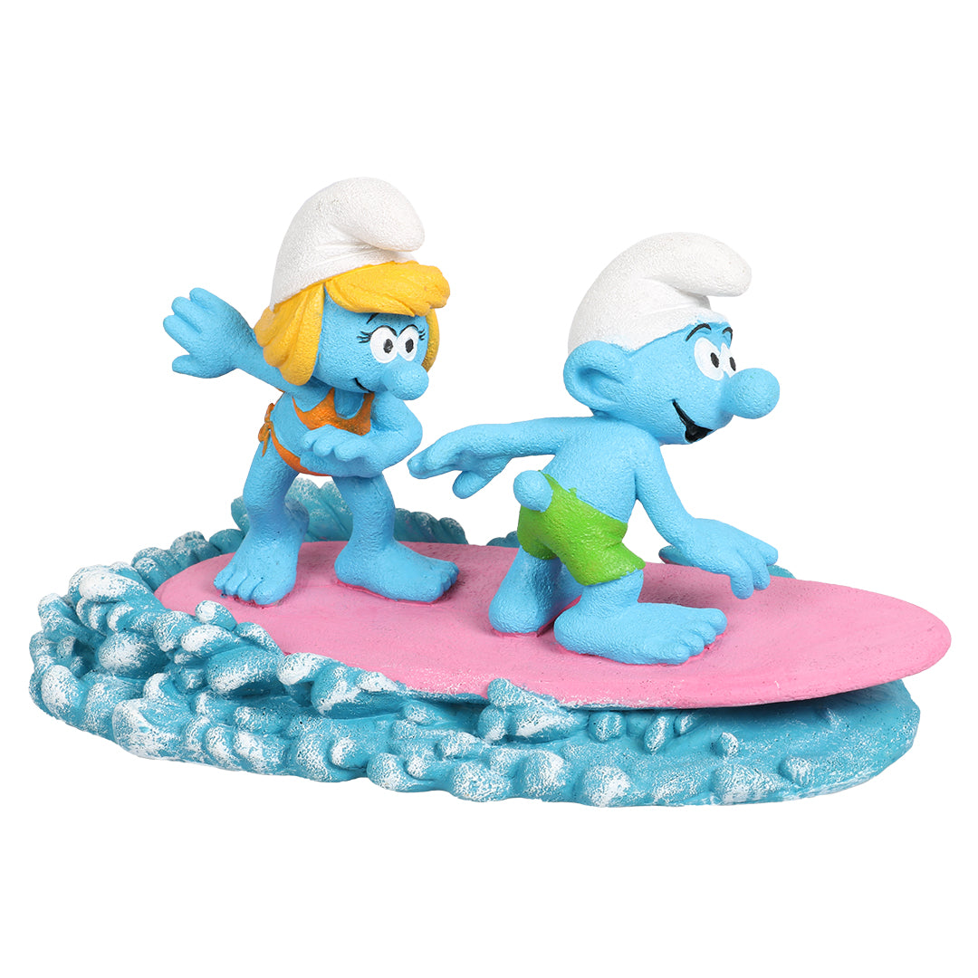 Schlumpfine mit Schlumpf auf dem Surfbrett - Figur
