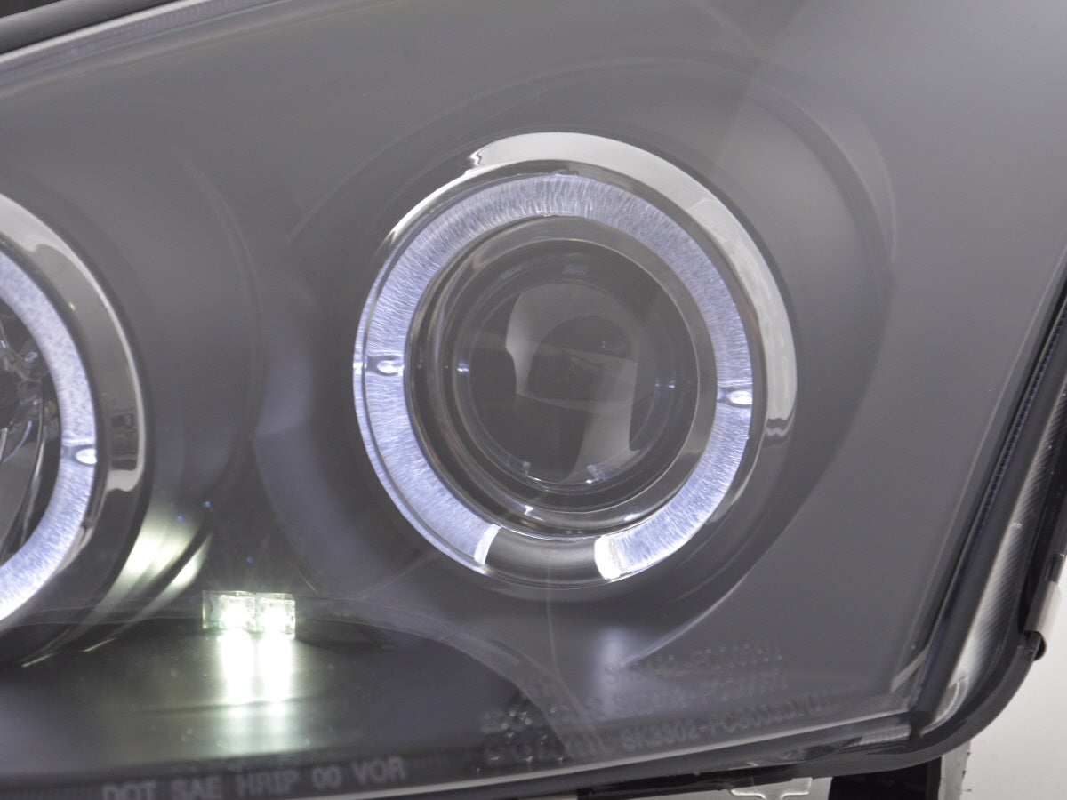 Headlight set Ford Focus 98-01 black