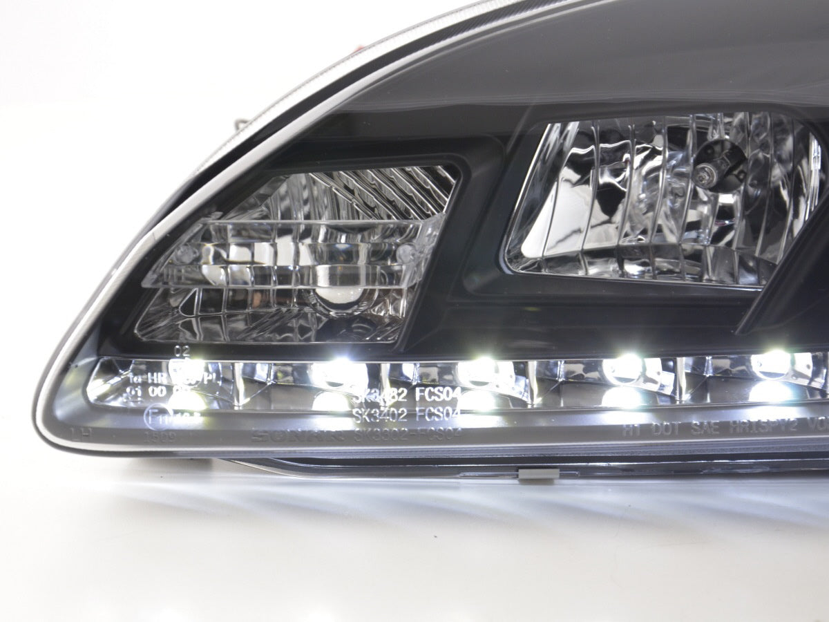 Scheinwerfer Set Daylight LED TFL-Optik Ford Focus 4/5-trg.  05-08 schwarz für Rechtslenker