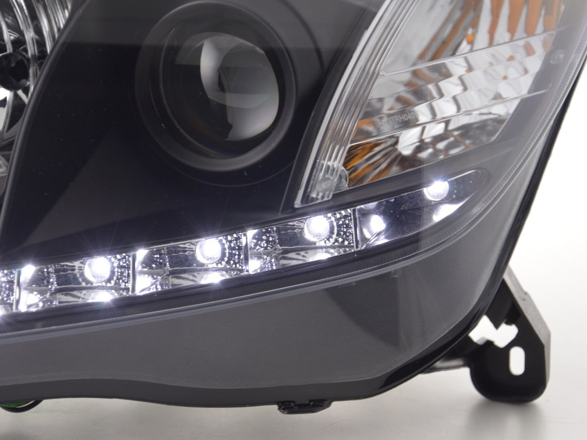 Scheinwerfer Set Daylight LED TFL-Optik Opel Astra H  04-10 schwarz für Rechtslenker