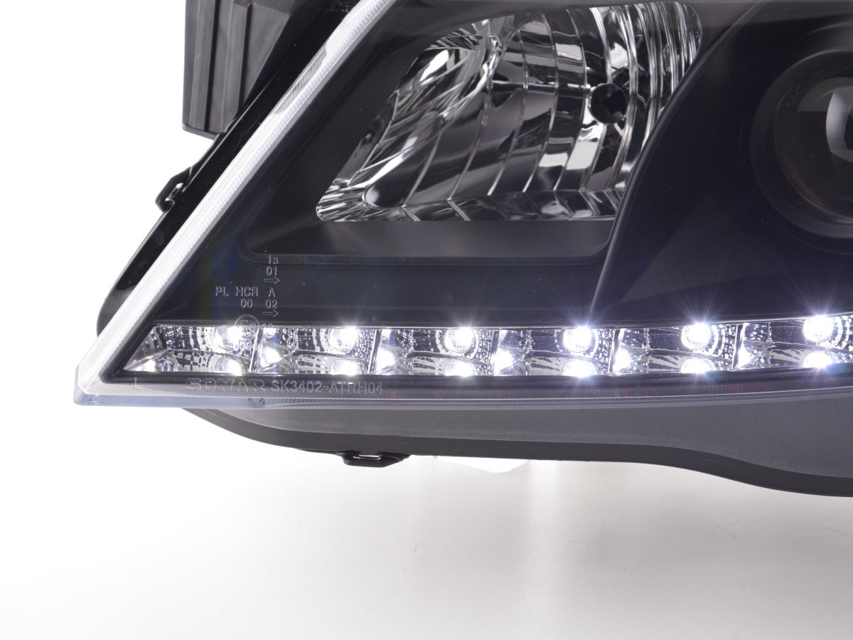 Scheinwerfer Set Daylight LED TFL-Optik Opel Astra H  04-10 schwarz für Rechtslenker