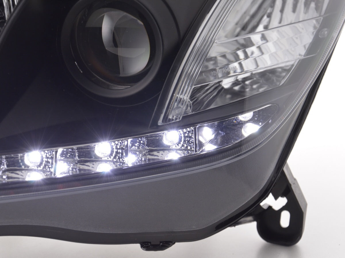 Scheinwerfer Set Daylight LED TFL-Optik Opel Astra H  04-10 schwarz für Rechtslenker