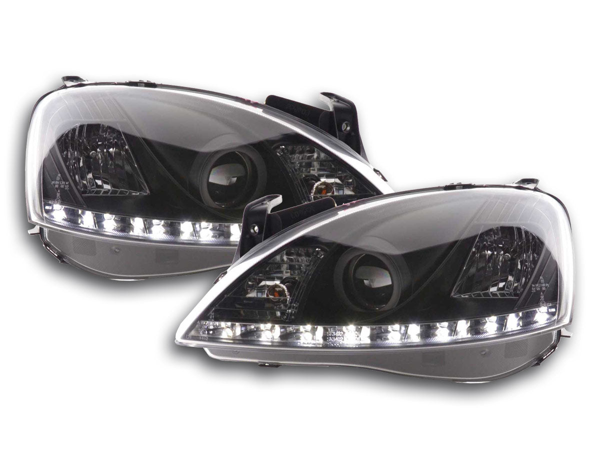 Headlight set Daylight LED DRL look Opel Corsa D 06- black