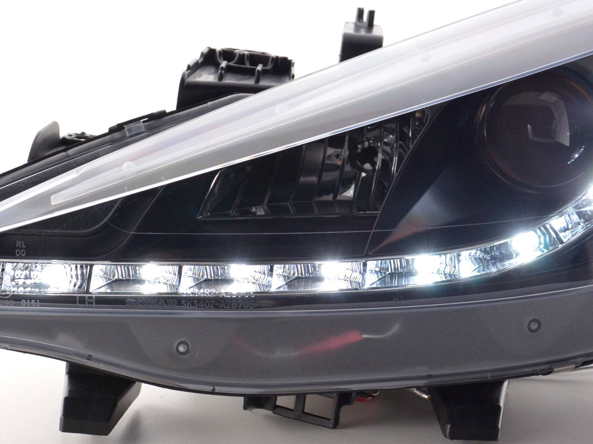 Headlight set Daylight LED DRL look Peugeot 207 06- black